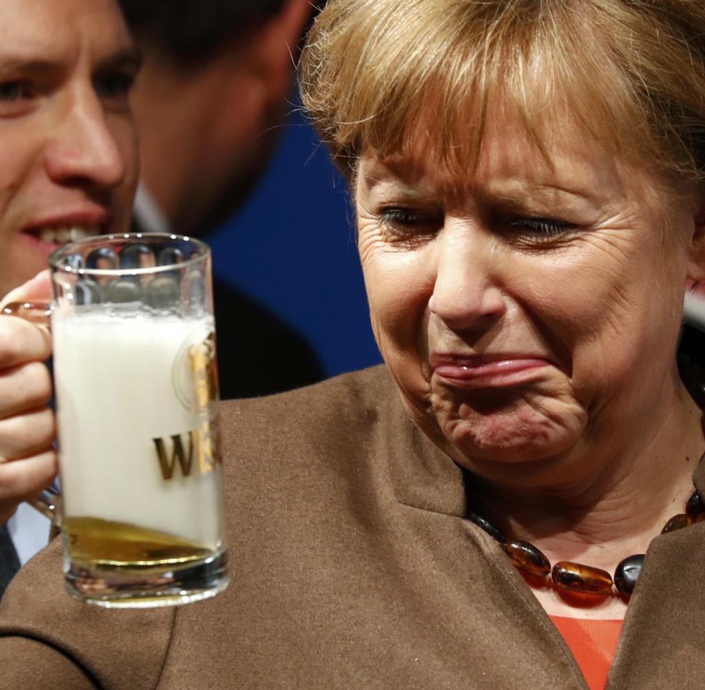 german-chancellor-merkel-drinks-beer-during-cdu-....jpg
