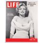 http://www.icollector.com/Life-magazine-newsstand-poster-of-Marilyn-Monroe-s-first-Life-cover-1952_i11537144